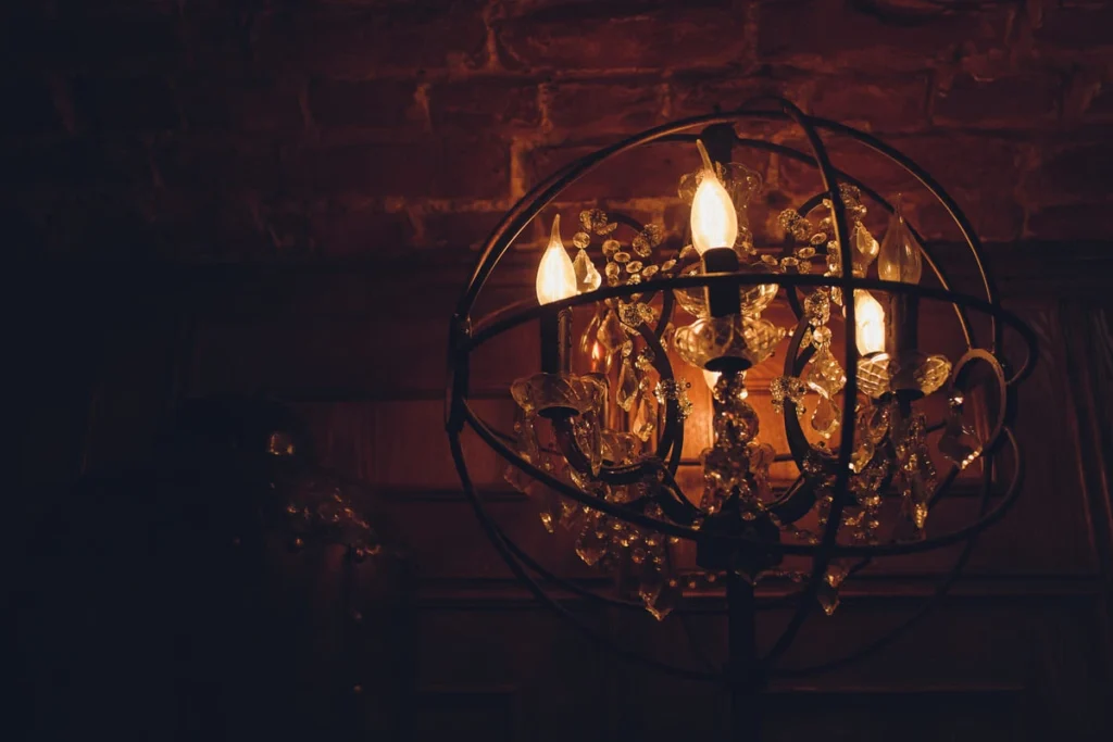 brass chandelier candlelight closeup