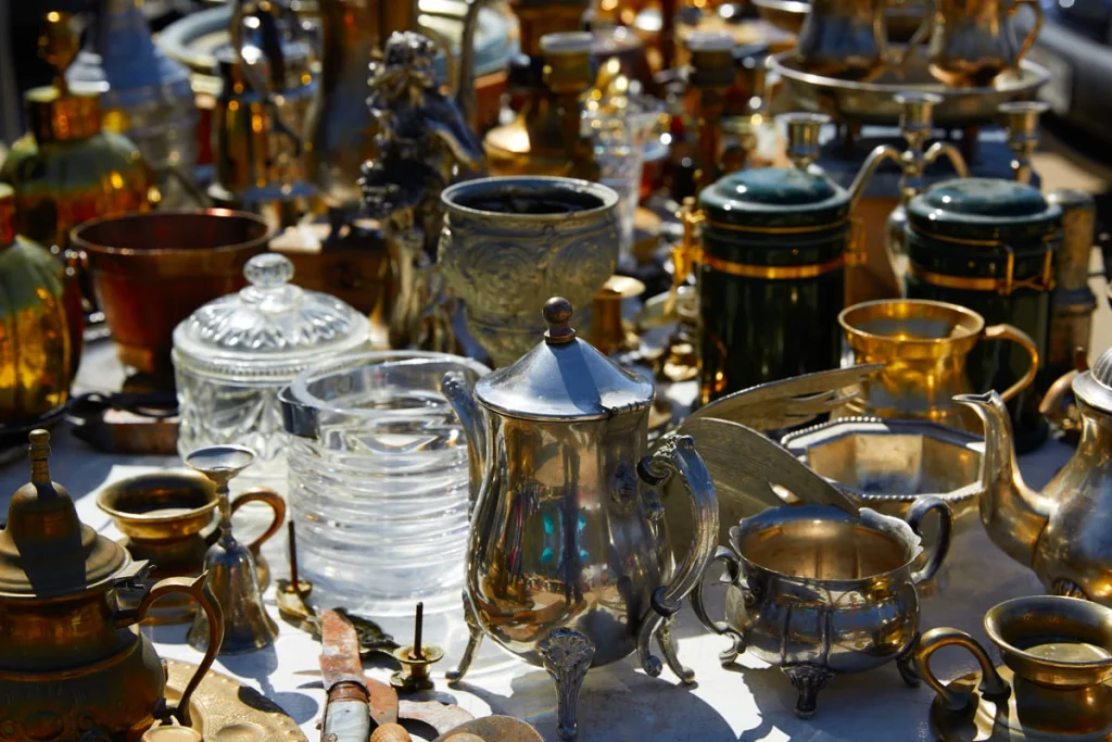 Vintage pieces for sale at an outdoor antiques market