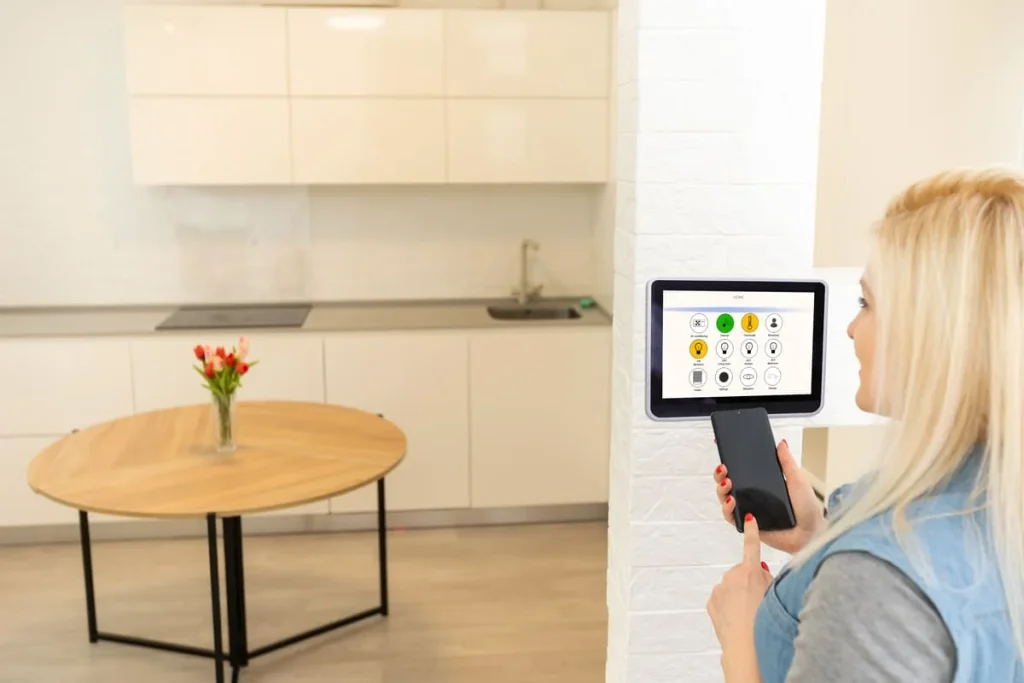 How smart light bulbs work: a phone app adjusting the bulb’s brightness and color temperature